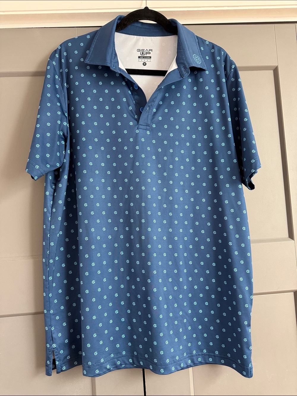 Men’s Gear Up Blue Golf Polo with all over logo Print